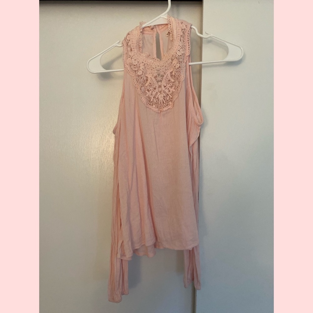 sheer pink crochet top with shoulder cutouts